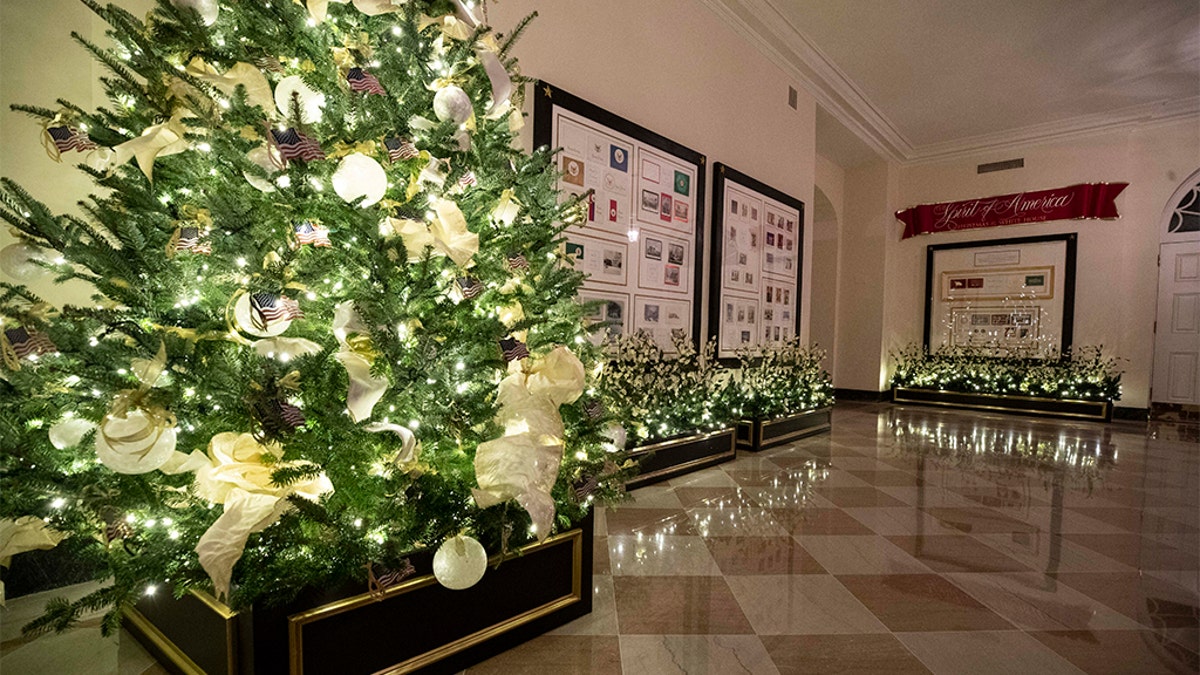 The American flag decorates a tree during the 2019 Christmas preview at the White House, Monday, Dec. 2, 2019, in Washington. (AP Photo/Alex Brandon)