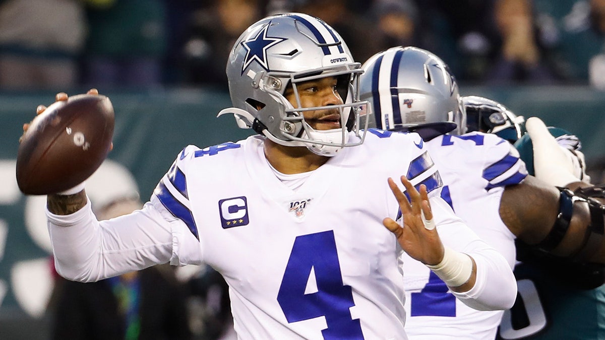 Dallas Cowboys quarterback Dak Prescott throws a pass during the first half of an NFL football game against the Philadelphia Eagles Sunday, Dec. 22, 2019, in Philadelphia. (AP Photo/Chris Szagola)