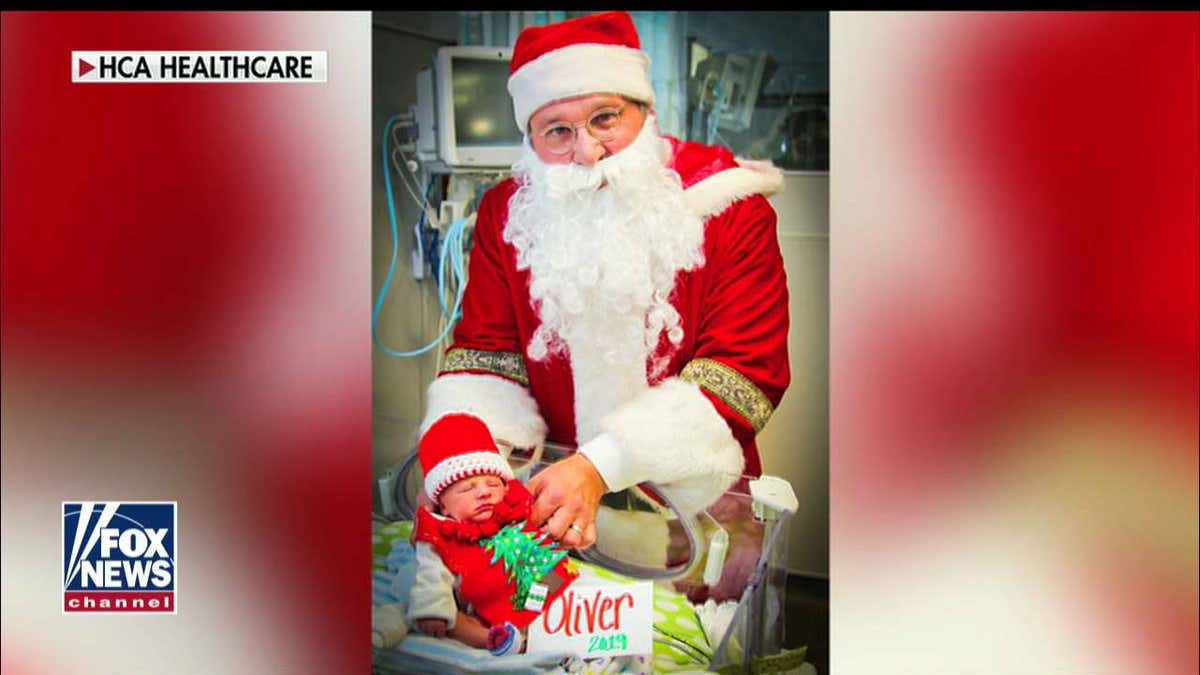Oliver Holmes in his 'ugly' Christmas sweater.
