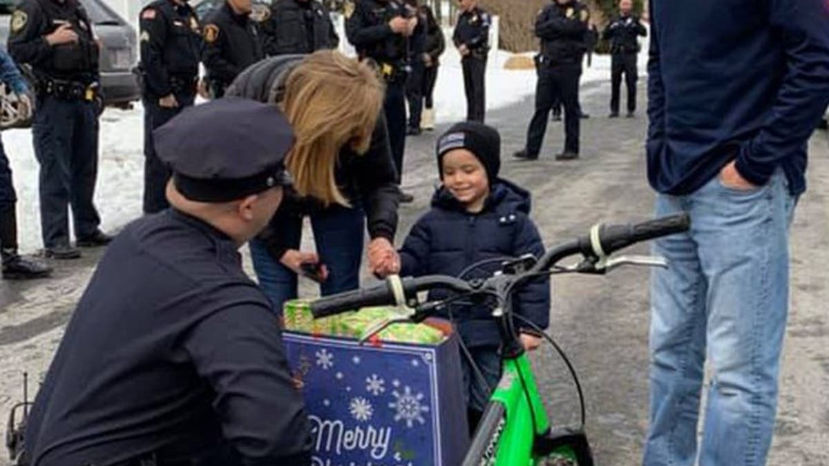JJ's mother "unexpectedly and tragically" died in November. Knowing it was the boy's first Christmas without her, the police officers wanted to him a special holiday.