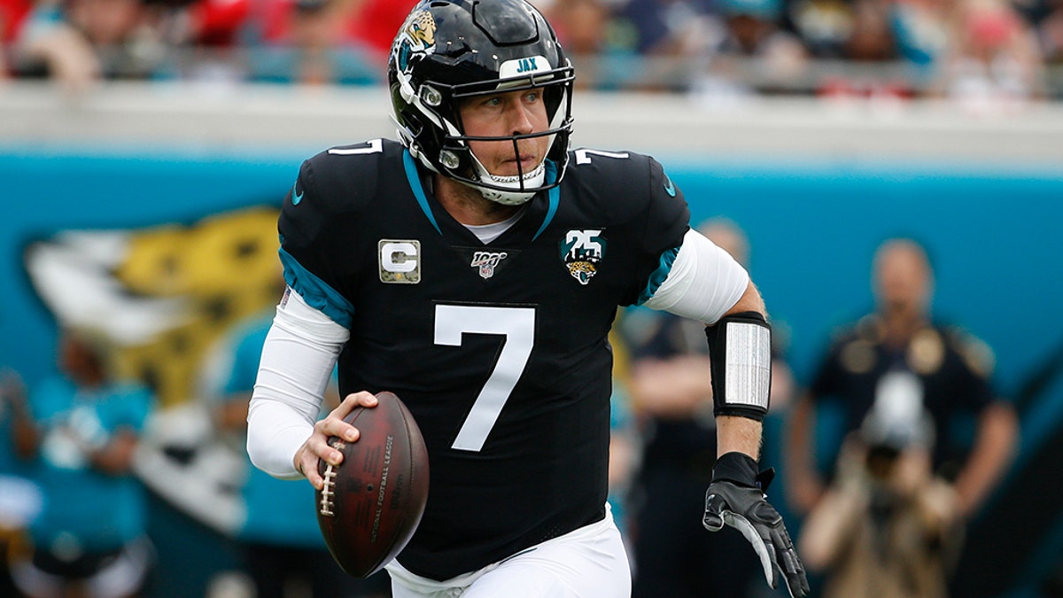 Jacksonville Jaguars quarterback Nick Foles (7) looks for a receiver against the Tampa Bay Buccaneers during the first half of an NFL football game, Sunday, Dec. 1, 2019, in Jacksonville, Fla. (AP Photo/Stephen B. Morton)