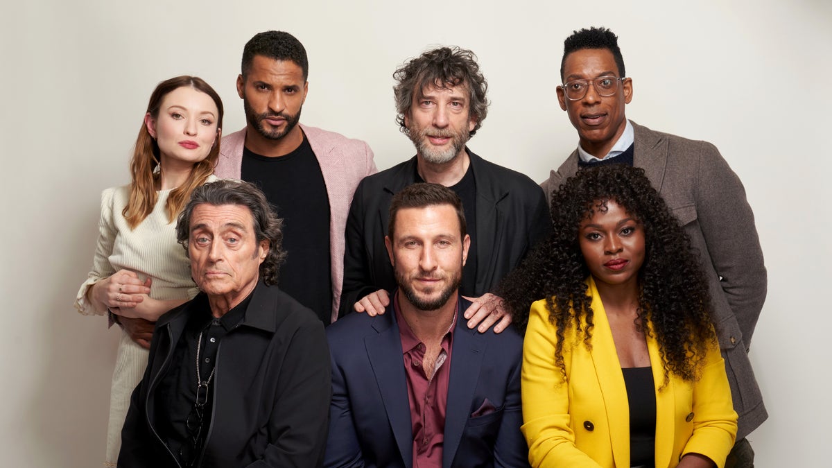 The cast of "American Gods." Counter-clockwise from the left: Emily Browning, Ian McShane, Ricky Whittle, Neil Gaiman, Pablo Schreiber, Orlando Jones, and Yetide Badakia. (Photo by Corey Nickols/Getty Images)