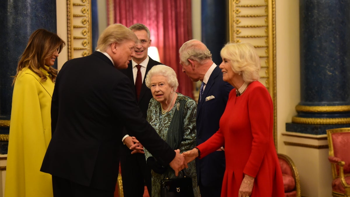 Queen Elizabeth II, Prince Charles and Duchess Camilla welcome Donald and Melania Trump to Buckingham Palace. Her Majesty Queen Elizabeth II hosted the reception for NATO Leaders to mark 70 years of the NATO Alliance. (Photo by Geoff Pugh - WPA Pool/Getty Images)