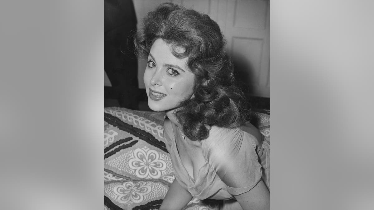 Tina Louise at the Savoy Hotel in London, shortly before the premiere of her latest film "God's Little Acre," circa 1958.