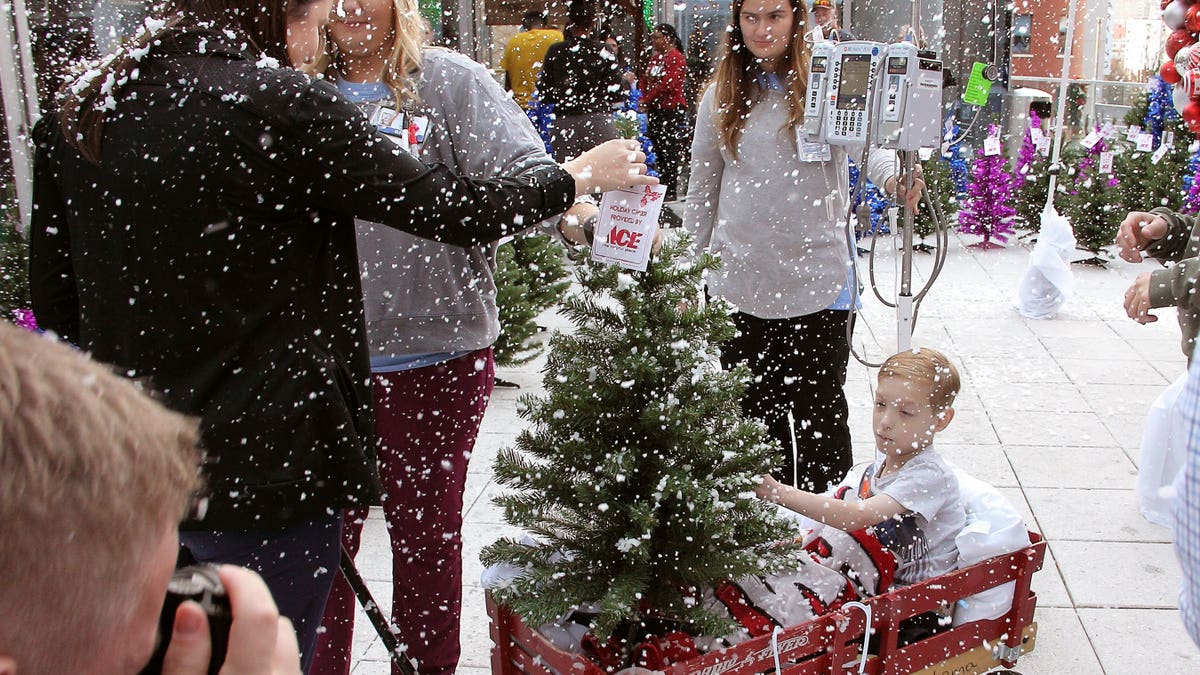 Children were then encouraged to decorate their trees with ornaments that they made.