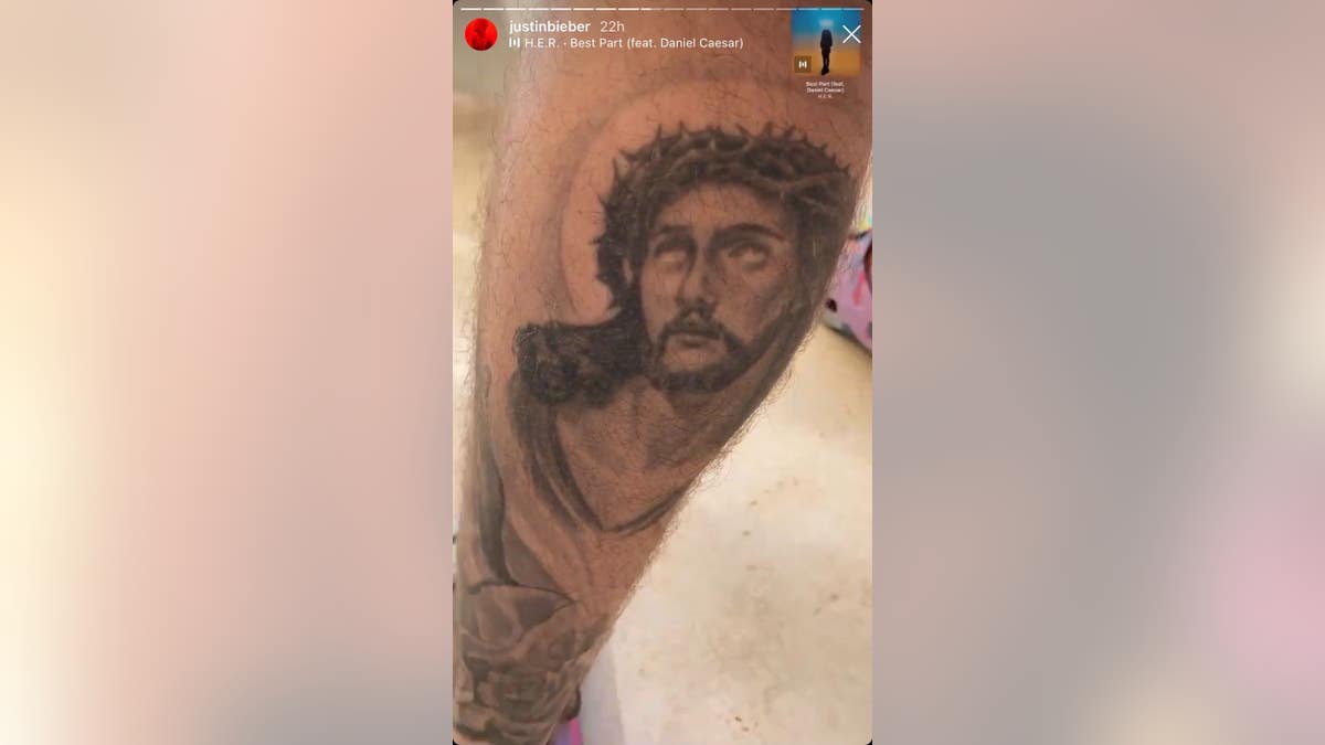 Justin Bieber's Jesus Christ tattoo on his left calf.