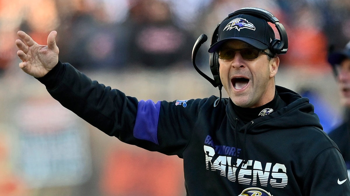 Harbaugh, Ravens happily travel road to success in playoffs