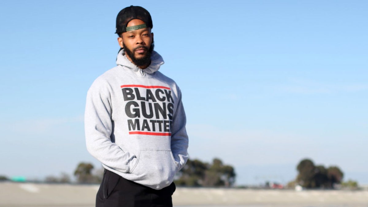 Maj Toure of Black Guns Matter poses for a picture in the Los Angeles County Storm Drain on Dec. 1, 2016, in Los Angeles, California.