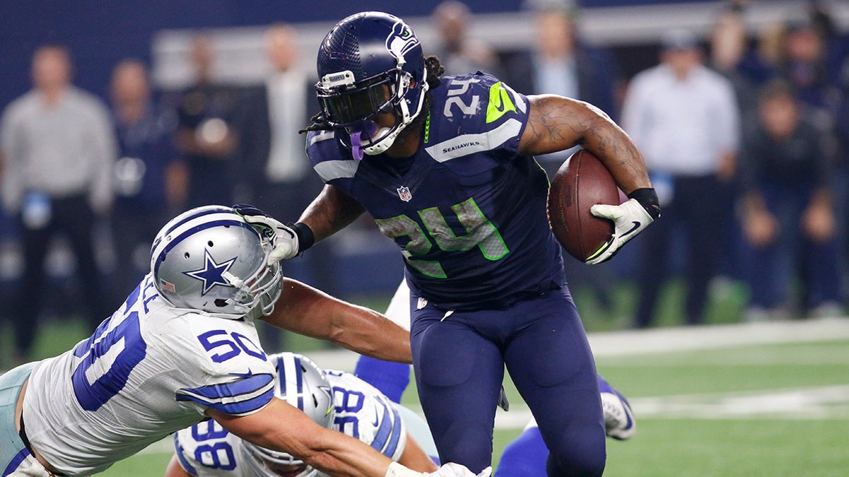 Marshawn Lynch shakes tacklers, then hands for Seahawks - The Columbian