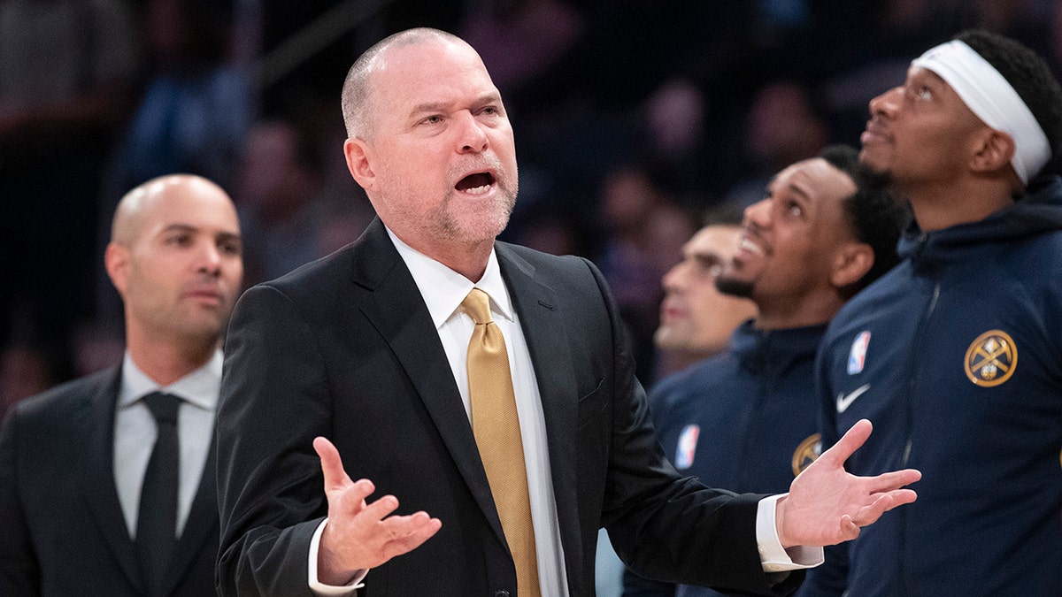 Denver Nuggets coach Michael Malone reacts during the first half of the team's NBA basketball game against the New York Knicks, Thursday, Dec. 5, 2019, at Madison Square Garden in New York. 