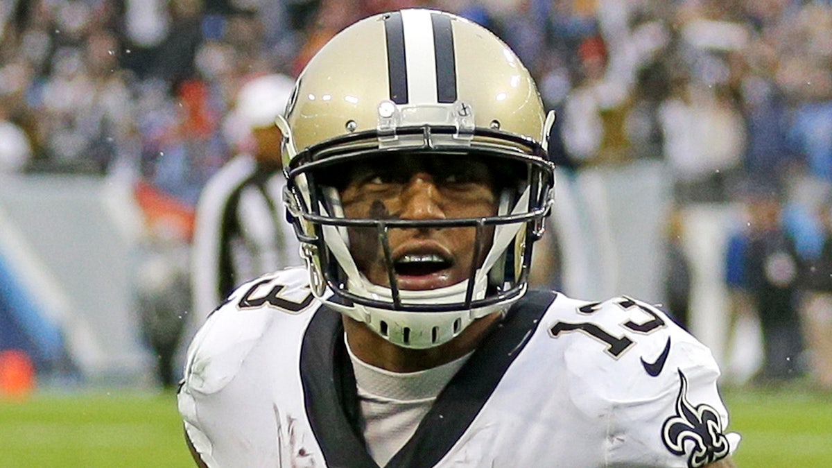 New Orleans Saints wide receiver Michael Thomas (13) scores a touchdown on a 2-yard pass reception against the Tennessee Titans in the second half of an NFL football game Sunday, Dec. 22, 2019, in Nashville, Tenn. The Saints won 38-28.