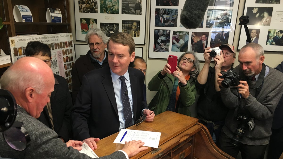 Sen. Michael Bennet of Colorado files to place his name on New Hampshire's primary ballot last month in Concord.