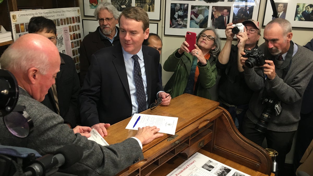 Sen. Michael Bennet of Colorado files to place his name on New Hampshire's primary ballot last month in Concord.