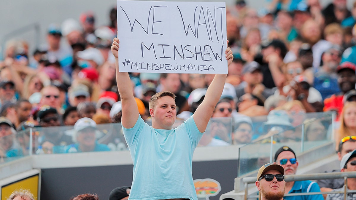 A Jacksonville Jaguars fan holding a sign about Gardner Minshew during the first quarter of a game at TIAA Bank Field on Dec. 1. (Photo by James Gilbert/Getty Images)