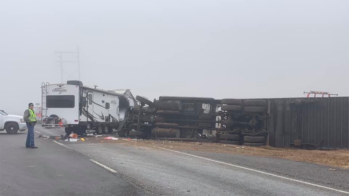 A tractor-trailer jackknifed and rolled over as it crashed into a pileup on Highway 84 in Lubbock County, Texas.
