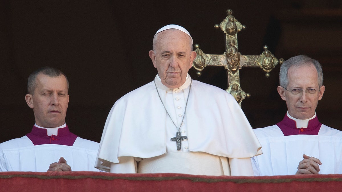 Pope Francis looks at the crowd after he delivered the Urbi et Orbi (Latin for 'to the city and to the world' ) Christmas' day blessing from the main balcony of St. Peter's Basilica at the Vatican, Wednesday, Dec. 25, 2019. (AP Photo/Alessandra Tarantino)