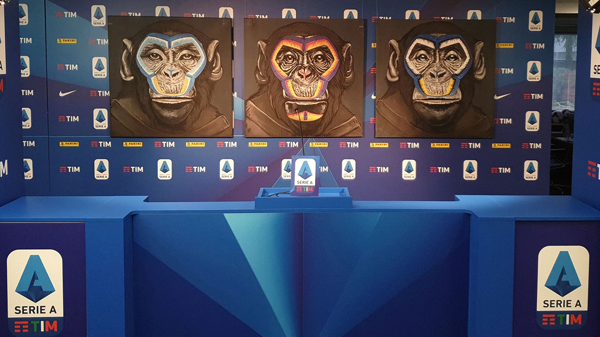 Anti-racism campaign artwork by Italian artist Simone Fugazzotto, featuring three side-by-side paintings of apes, is presented by Italian soccer league Serie A during a news conference in Milan, Italy, on Tuesday. Fare, a soccer anti-discrimination group, says the images are "counter-productive and [will] continue the dehumanization of people of African heritage."