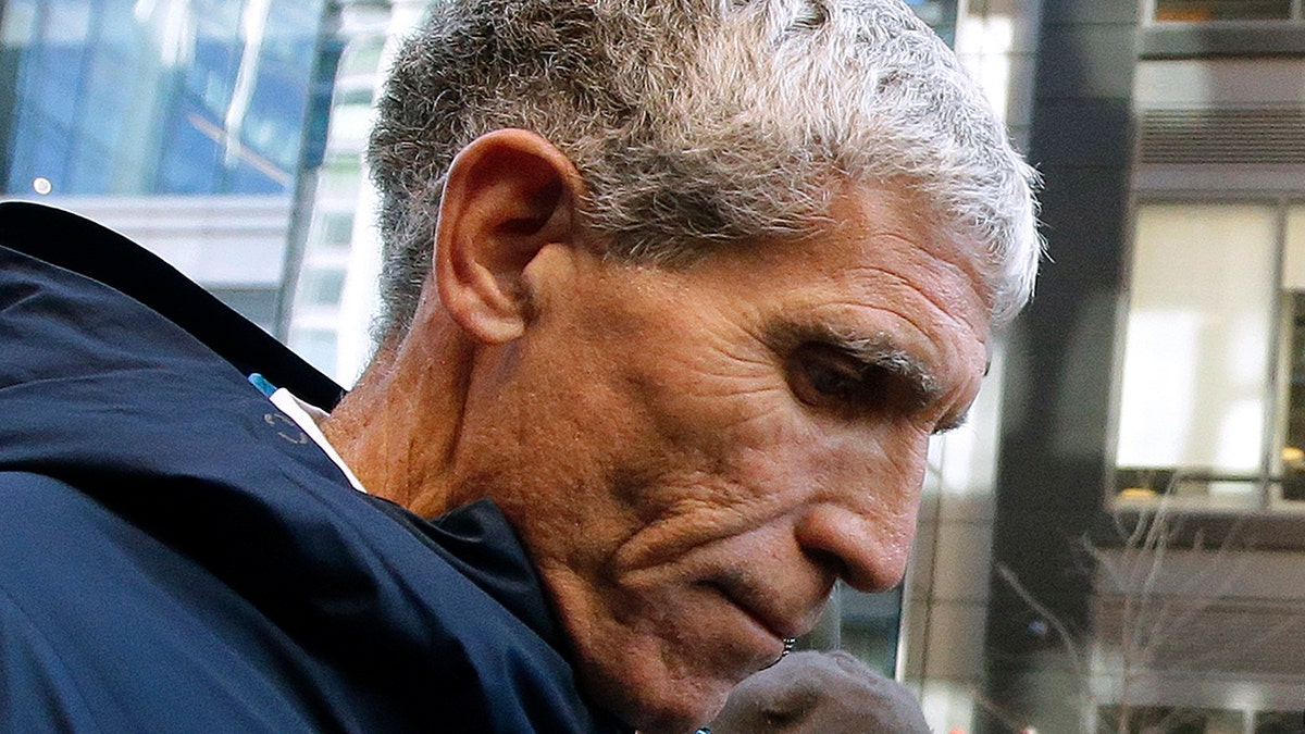 William "Rick" Singer, founder of the Edge College &amp; Career Network, leaves federal court in Boston after pleading guilty on March 12, 2019. (AP Photo/Steven Senne, File)