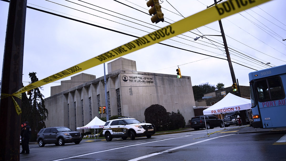 Police tape is viewed around the area on October 28, 2018 outside the Tree of Life Synagogue after a shooting there left 11 people dead in the Squirrel Hill neighborhood of Pittsburgh on October 27, 2018.