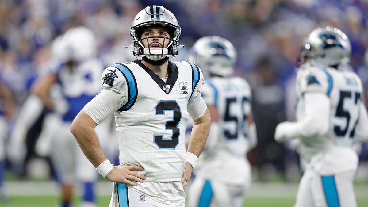 Carolina Panthers quarterback Will Grier (3) looks at a replay during the second half of an NFL football game against the Indianapolis Colts, Sunday, Dec. 22, 2019, in Indianapolis. (AP Photo/Michael Conroy)