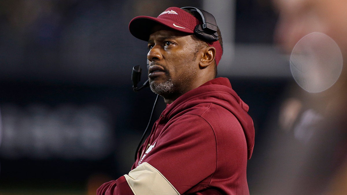 FILE - In this Saturday, Oct. 19, 2019, file photo, Florida State coach Willie Taggart watches his team play Wake Forest during the first half of an NCAA college football game in Winston-Salem, N.C. Florida Atlantic has reached an agreement with Taggart to be its new football coach, replacing Lane Kiffin, said a person familiar with the negotiations. (AP Photo/Nell Redmond, File)
