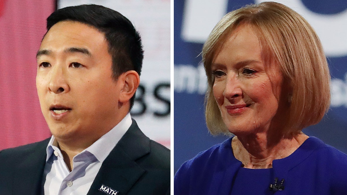 Judy Woodruff had an awkward moment with Andrew Yang, left, soon after the debate got underway. (Justin Sullivan/Getty Images)