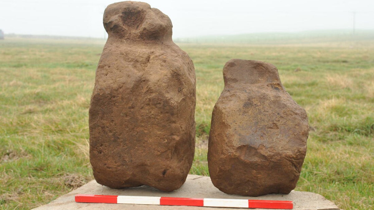 Two of the figurines before cleaning, Finstown, Orkney. (Credit: ORCA Archaeology)