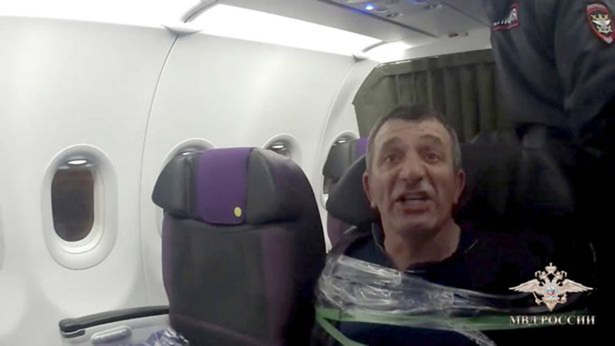 Russian airline passenger duct taped
