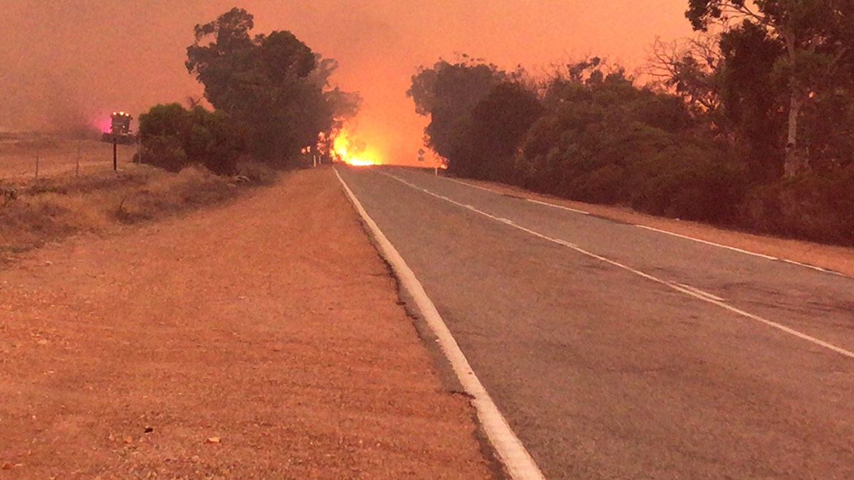 A fast-moving fire on Sunday approached the town of Mogumber, located about 80 miles northwest of Perth. 