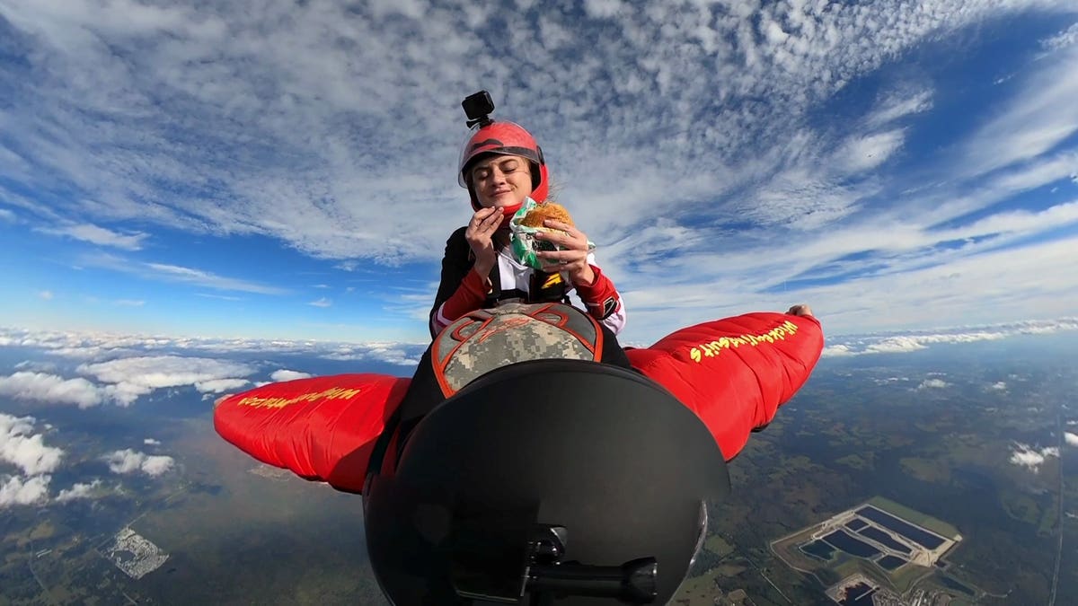 McKenna Knipe, 24, was filmed testing the Burger King Impossible Whopper using a GoPro while she was skydiving.