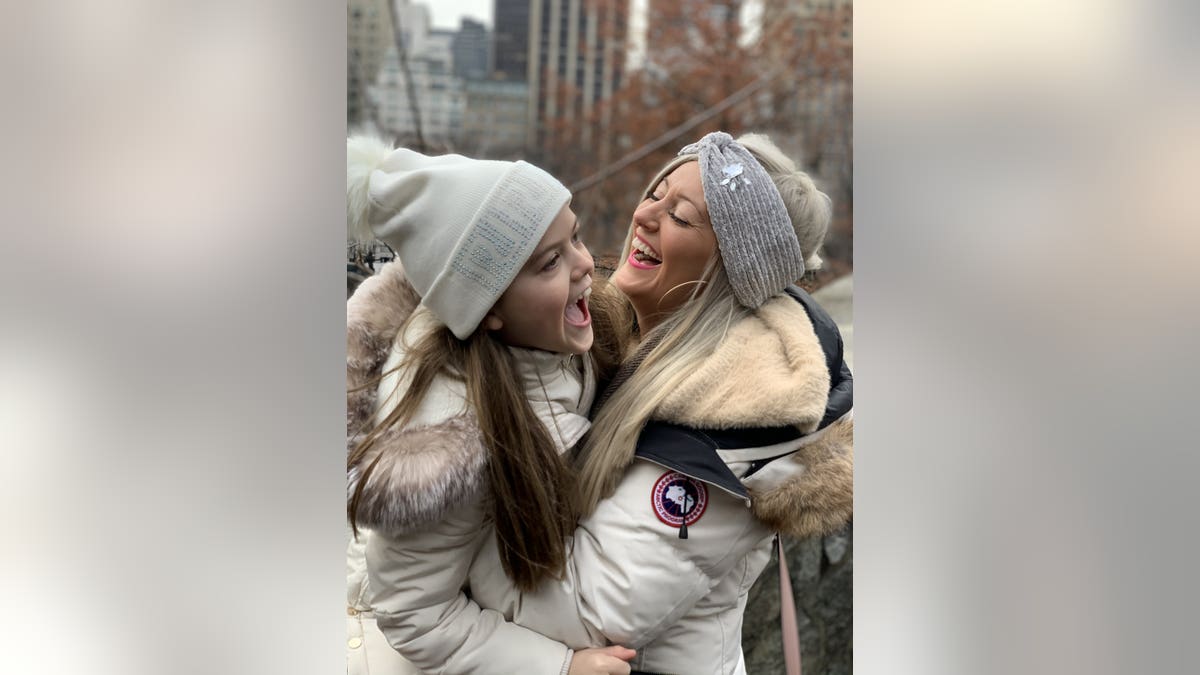 Jennifer Bell, 28, with daughter Georgia, 8, on a recent trip to New York.