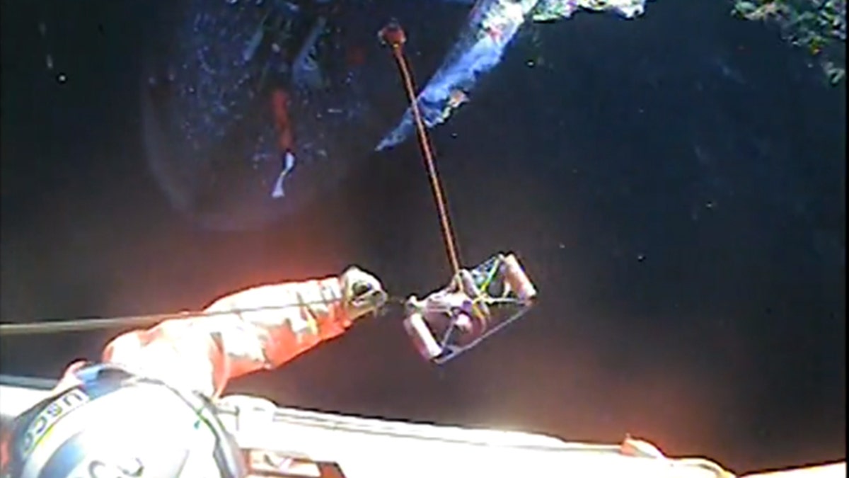 A dramatic video shows the U.S. Coast Guard rescuing a fisherman who was seriously injured off the coast of Washington over the weekend.