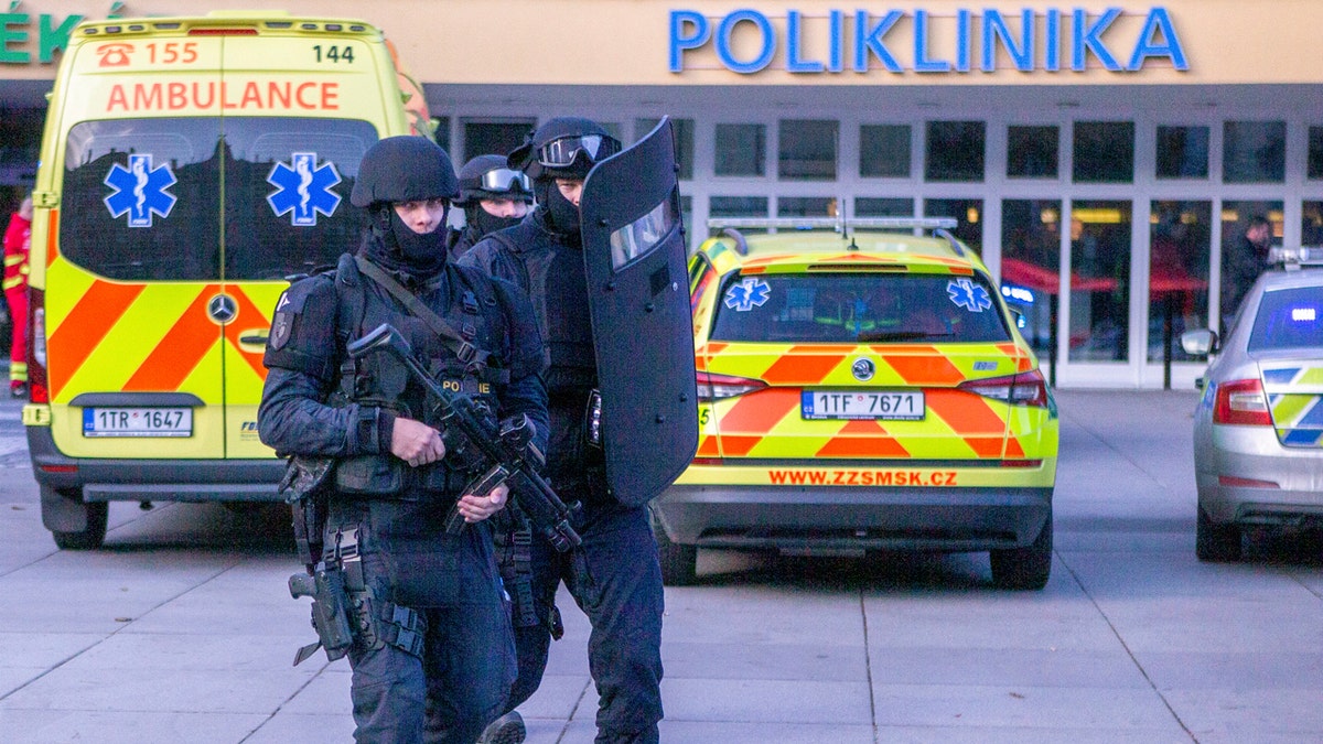 Police personnel outside the Ostrava Teaching Hospital after a shooting incident in Ostrava, Czech Republic, Tuesday, Dec. 10, 2019.