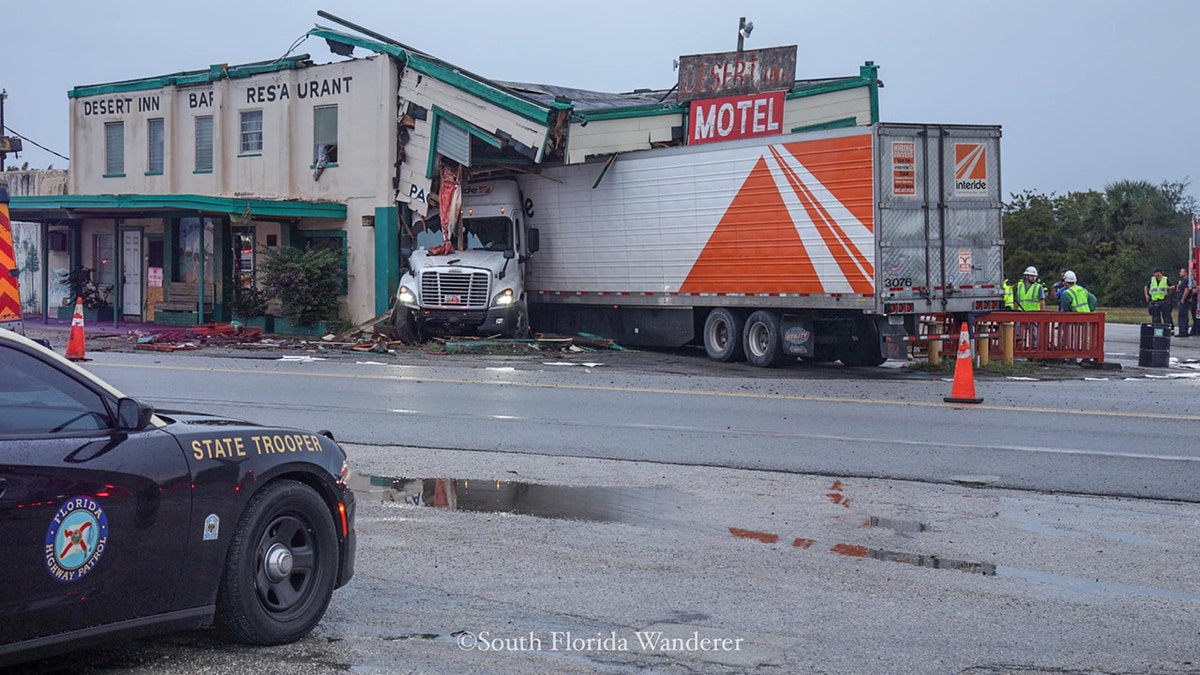 A tractor trailer slammed into the historic Desert Inn and Restaurant in Yeehaw Junction, Fla., early Sunday, according to a report.