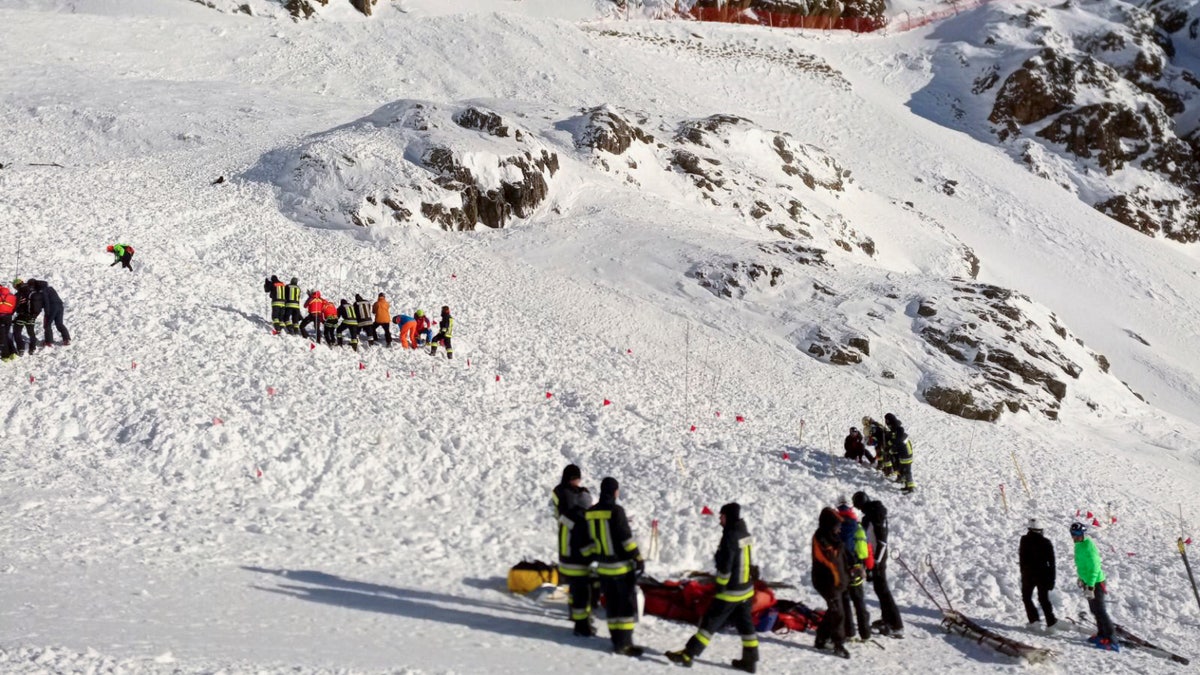 Rescuers at work following an avalanche in Val Senales, Saturday, Dec. 28, 2019.