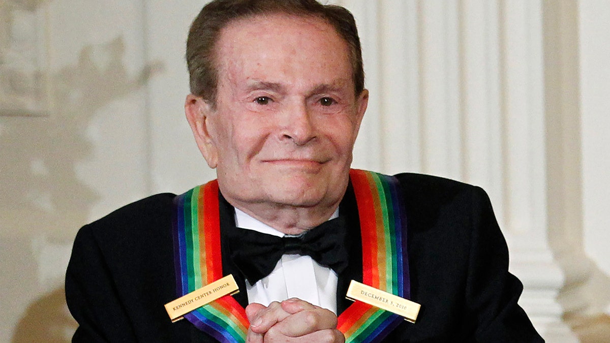 In this Dec. 5, 2010, file photo, composer Jerry Herman, one of the recipients of the 2010 Kennedy Center Honors is introduced during a reception in the East Room of the White House in Washington.