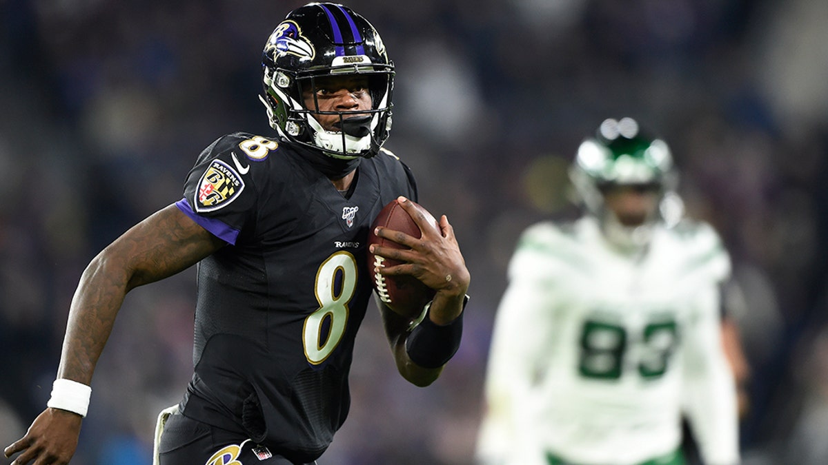 Ravens top Jets 42-21, clinch AFC North title on huge night for QB