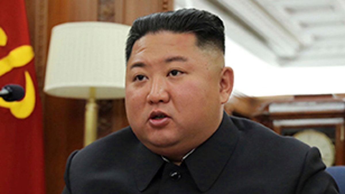 In this photo provided Sunday, Dec. 22, 2019, by the North Korean government, North Korean leader Kim Jong Un speaks during a ruling party meeting, North Korea. (Korean Central News Agency/Korea News Service via AP)