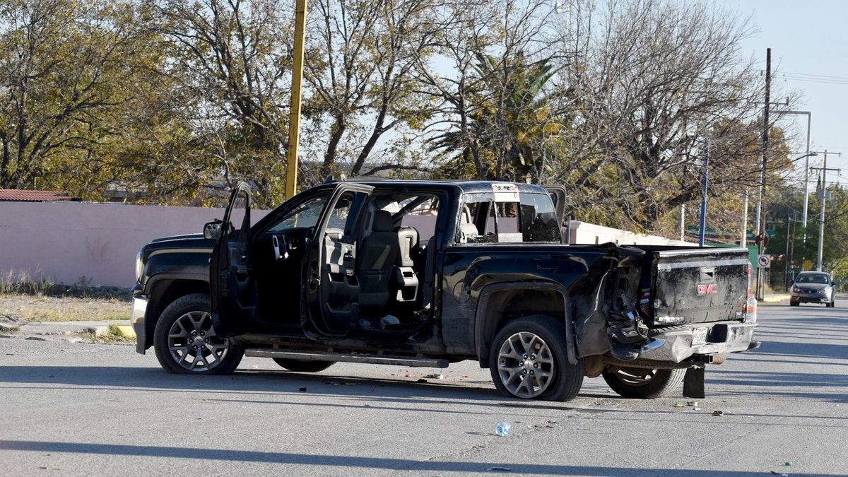 At least 14 people were killed, four of them police officers, after an armed group in a convoy of trucks stormed the town, in Coahuila state, prompting security forces to intervene, state Gov. Miguel Riquelme Solis said.