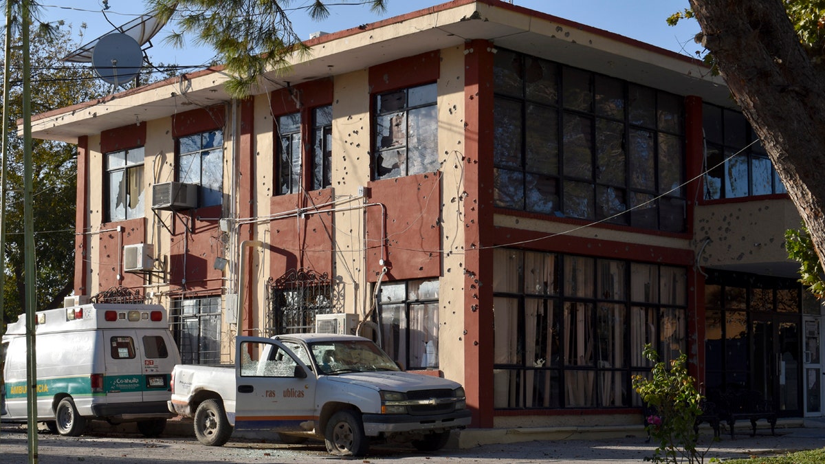 The City Hall of Villa Union is riddled with bullet holes after a gun battle between Mexican security forces and suspected cartel gunmen, Saturday, Nov. 30, 2019.