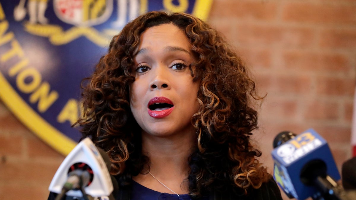 Maryland State Attorney Marilyn Mosby speaks during a news conference announcing the indictment of correctional officers, Tuesday, Dec. 3, 2019, in Baltimore. Twenty five correction officers, most of whom were taken into custody earlier in the day, are charged with using excessive force on detainees at state-operated Baltimore pretrial correctional facilities. (AP Photo/Julio Cortez)