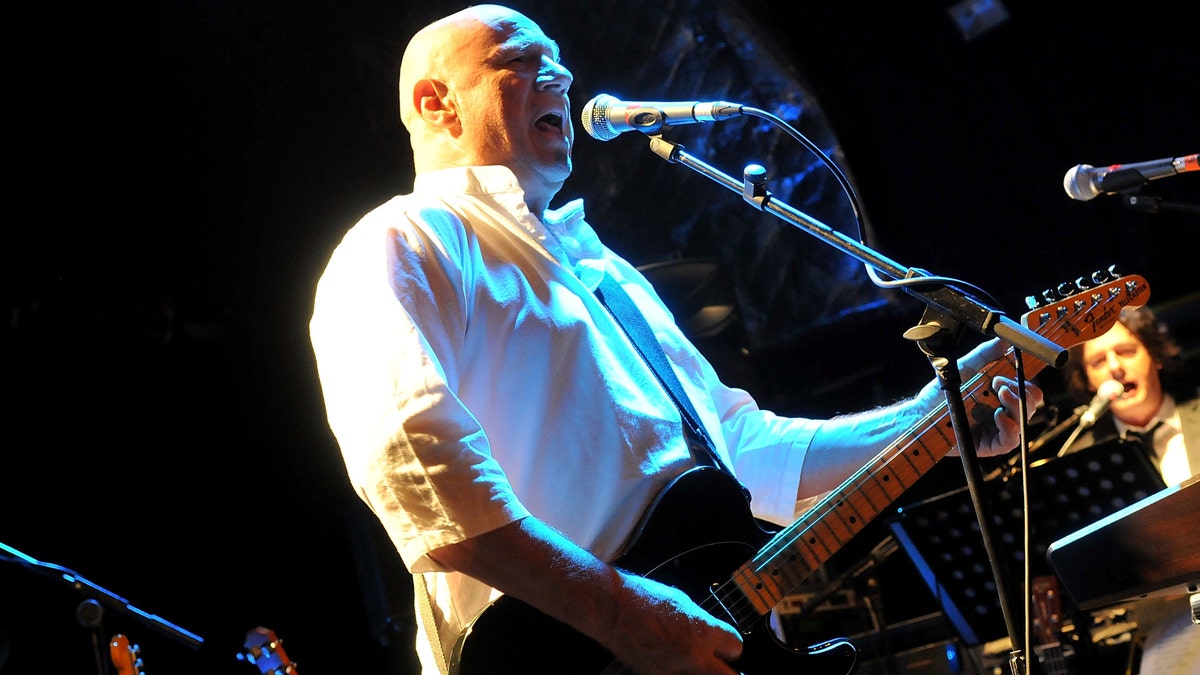 Neil Innes, as Ron Nasty, of The Rutles performs live on stage at the Islington Academy on May 22, 2014 in London, United Kingdom. 