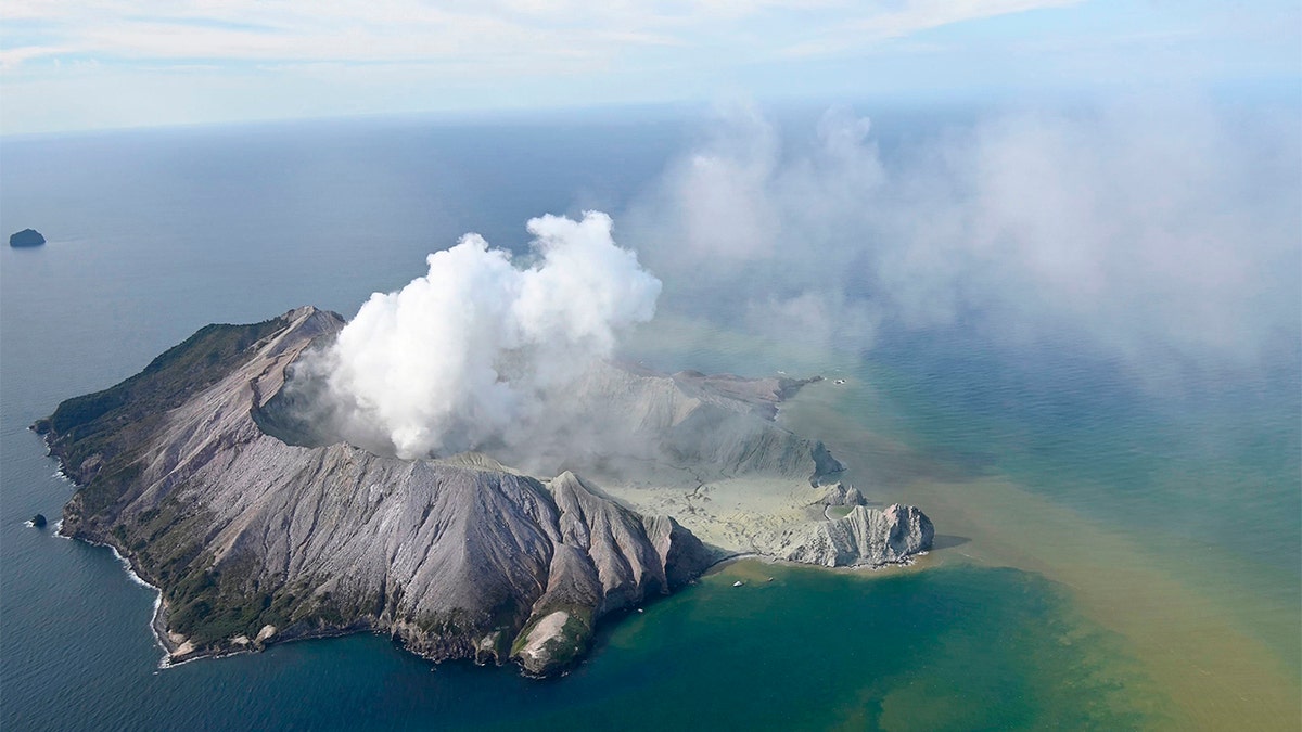 This aerial photo shows White Island after its volcanic eruption in New Zealand Monday, Dec. 9, 2019. (George Novak/New Zealand Herald via AP)