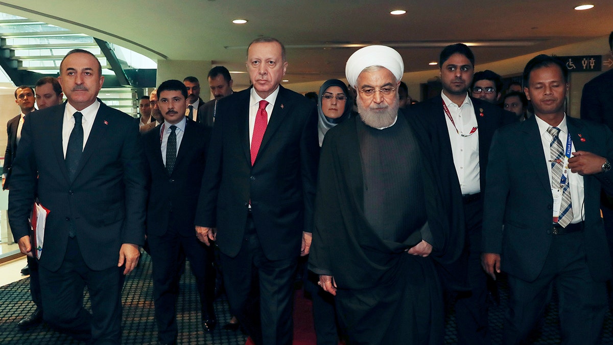 Turkey's President Recep Tayyip Erdogan, centre left, was among other world leaders present at the Islamic conference on Thursday. Erdogan and Rouhani had a meeting on the sidelines of the conference. (Presidential Press Service via AP, Pool)
