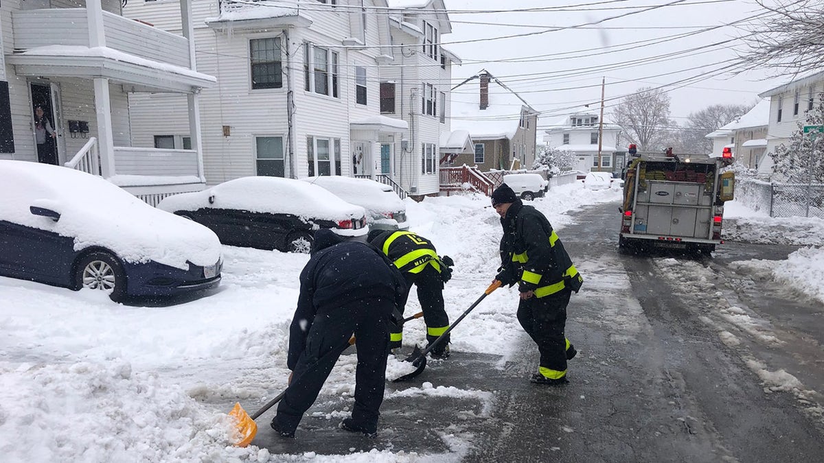 Firefighters helped shovel the man's driveway after freeing him from his snowblower.