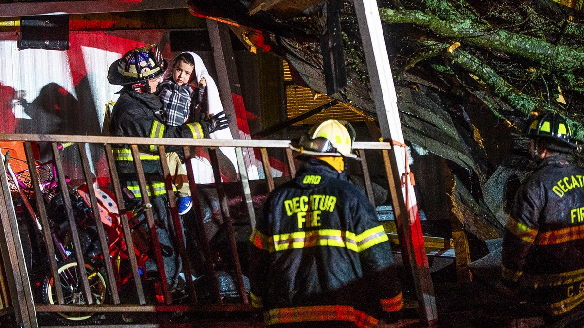 Powerful storms smashed buildings, splintered trees and downed power lines Monday around the Deep South.