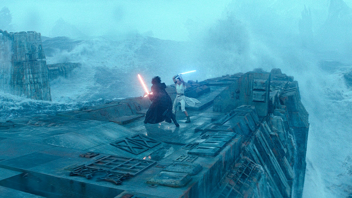 This image released by Lucasfilm shows Adam Driver as Kylo Ren, left, and Daisy Ridley as Rey in a scene from "Star Wars: The Rise of Skywalker."
