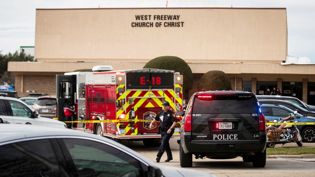 Police and fire departments surround the scene of a shooting at West Freeway Church of Christ in White Settlement, Texas, Sunday, Dec. 29, 2019.