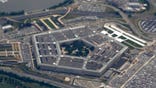 FILE - In this June 3, 2011, file photo, the Pentagon is seen from air from Air Force One. The House has passed its annual defense policy measure, which combines a $738 billion Pentagon price tag with legislation to provide federal employees with 12 weeks of paid parental leave. (AP Photo/Charles Dharapak, File)