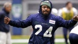 Seattle Seahawks running back Marshawn Lynch warms up at the NFL football team's practice facility Tuesday, Dec. 24, 2019, in Renton, Wash. When Lynch played his last game for the Seahawks in 2016, the idea of him ever wearing a Seahawks uniform again seemed preposterous. Yet, here are the Seahawks getting ready to have Lynch potentially play a major role Sunday against San Francisco with the NFC West title on the line. (AP Photo/Elaine Thompson)